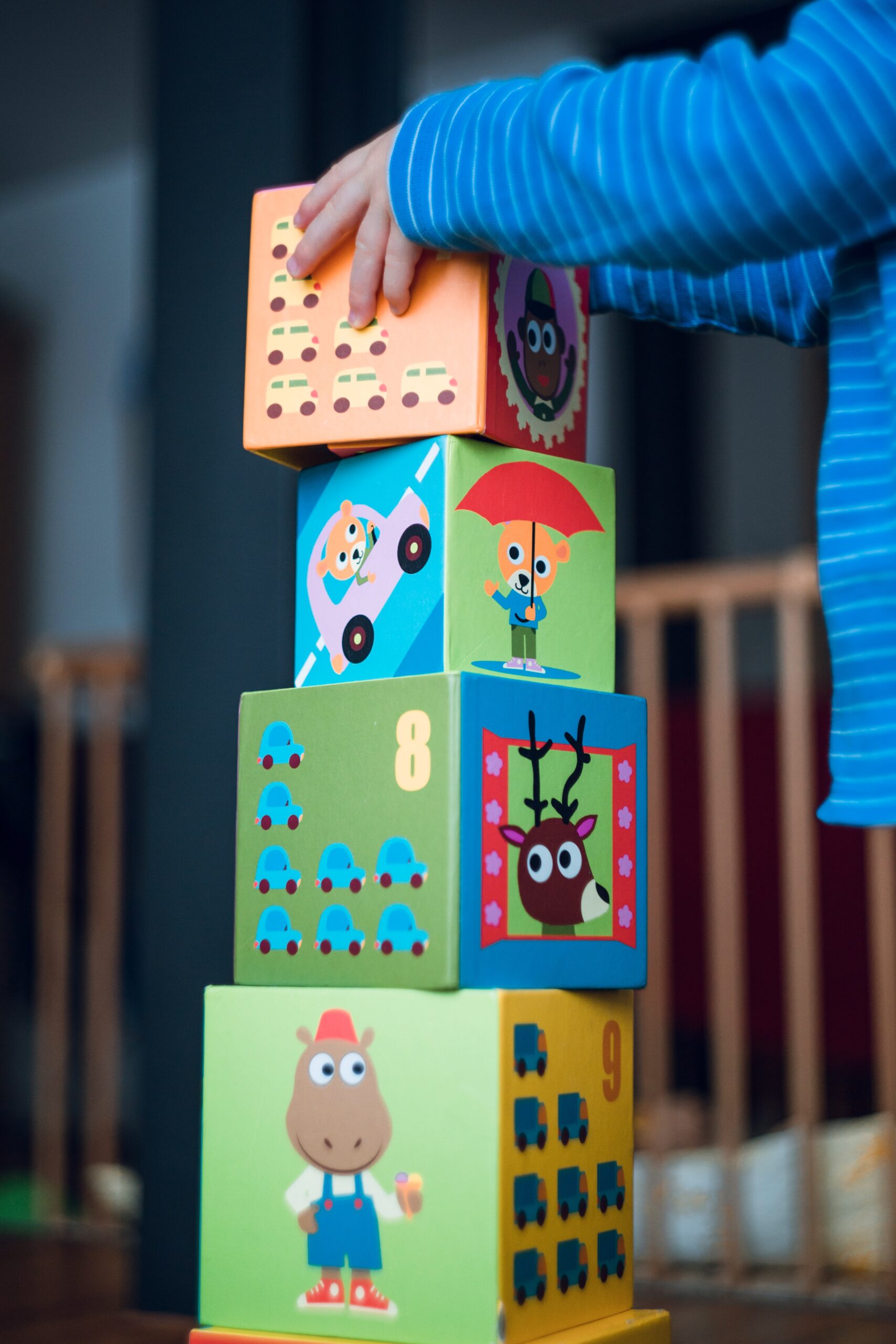 Child in preschool playing with building blocks